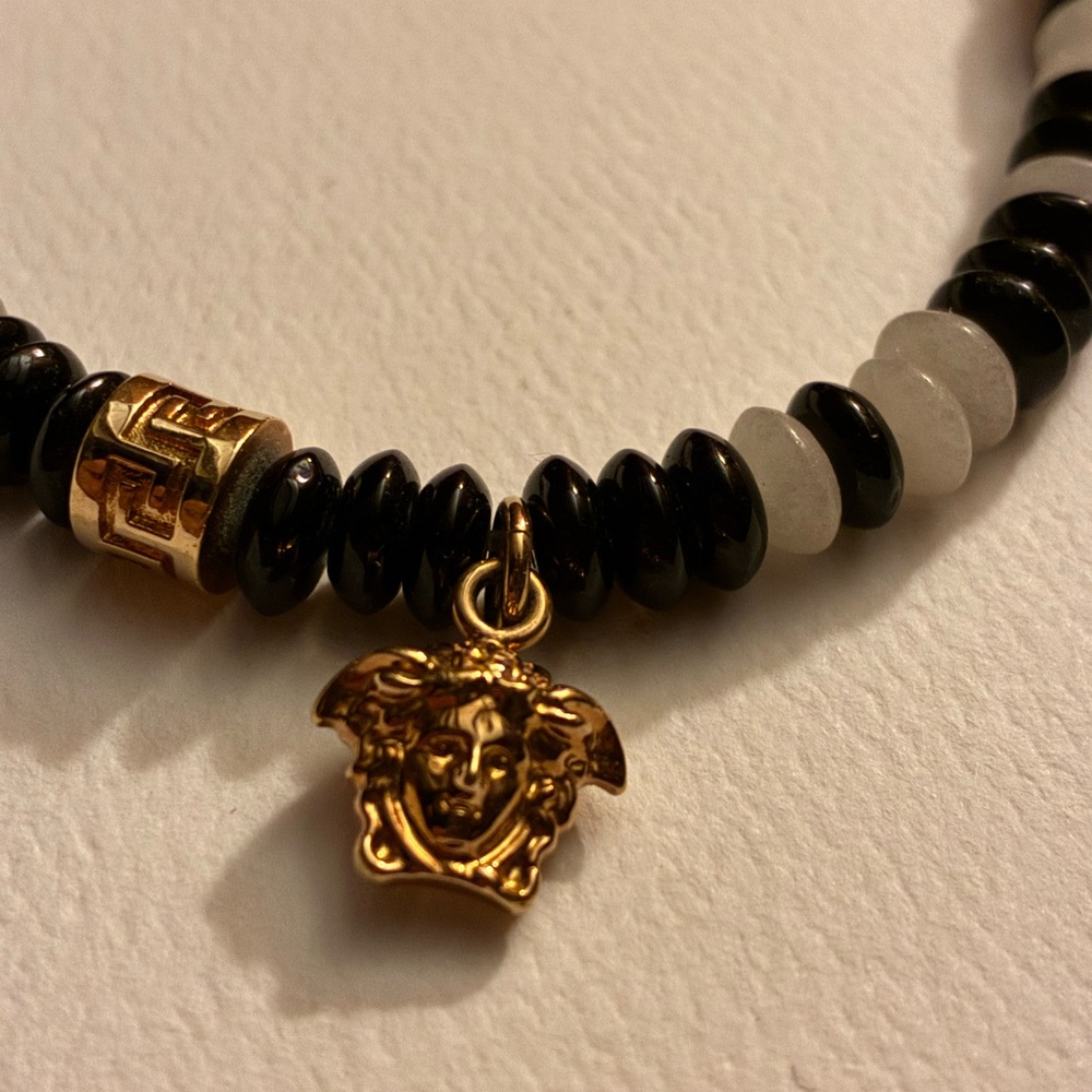 Gold and Black Beaded necklace with Medusa Charm